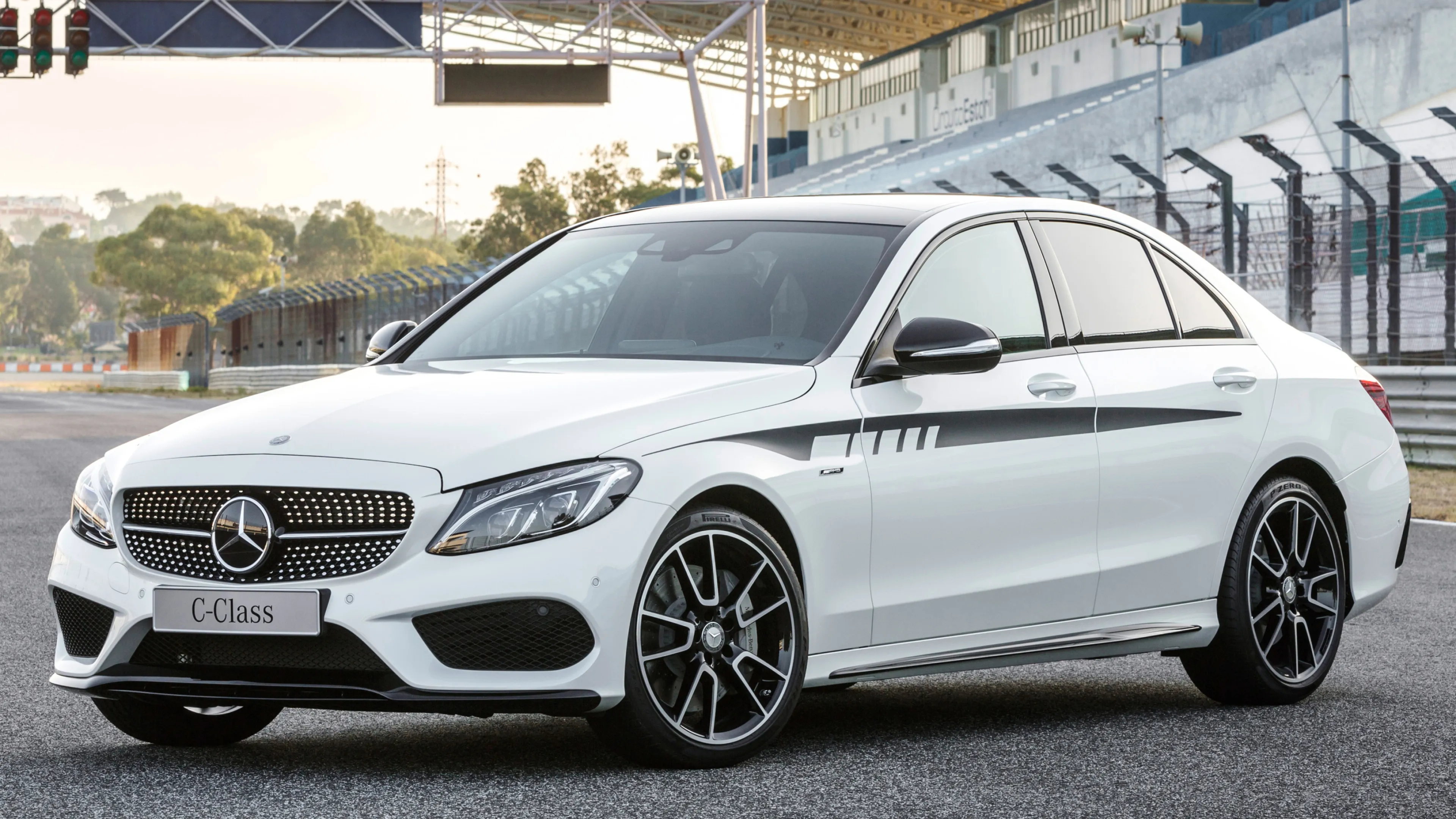 White Mercedes Benz Sports Wagon Parked on Race Track