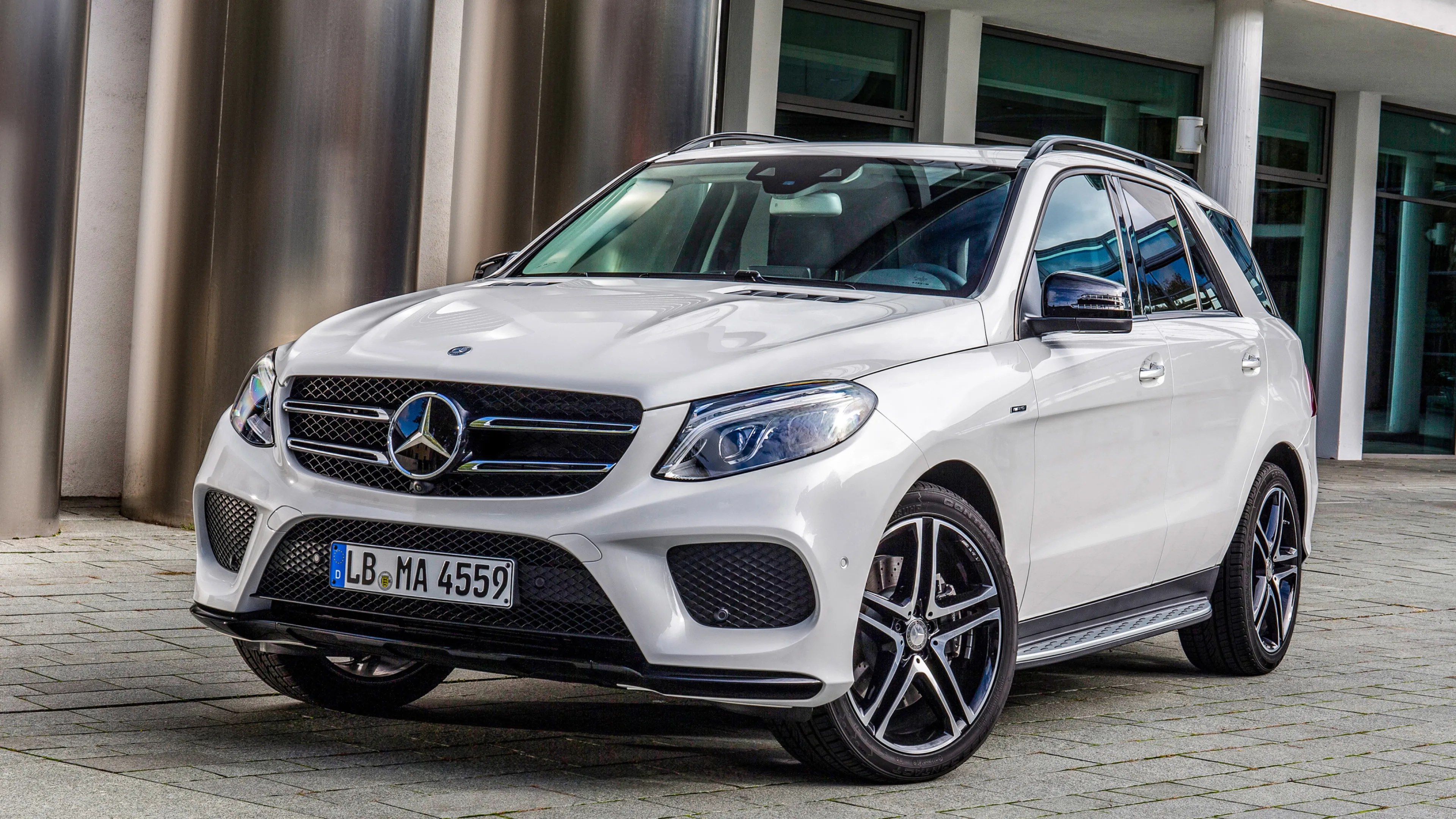 White Mercedes Benz SUV Ready for City Driving Wallpaper