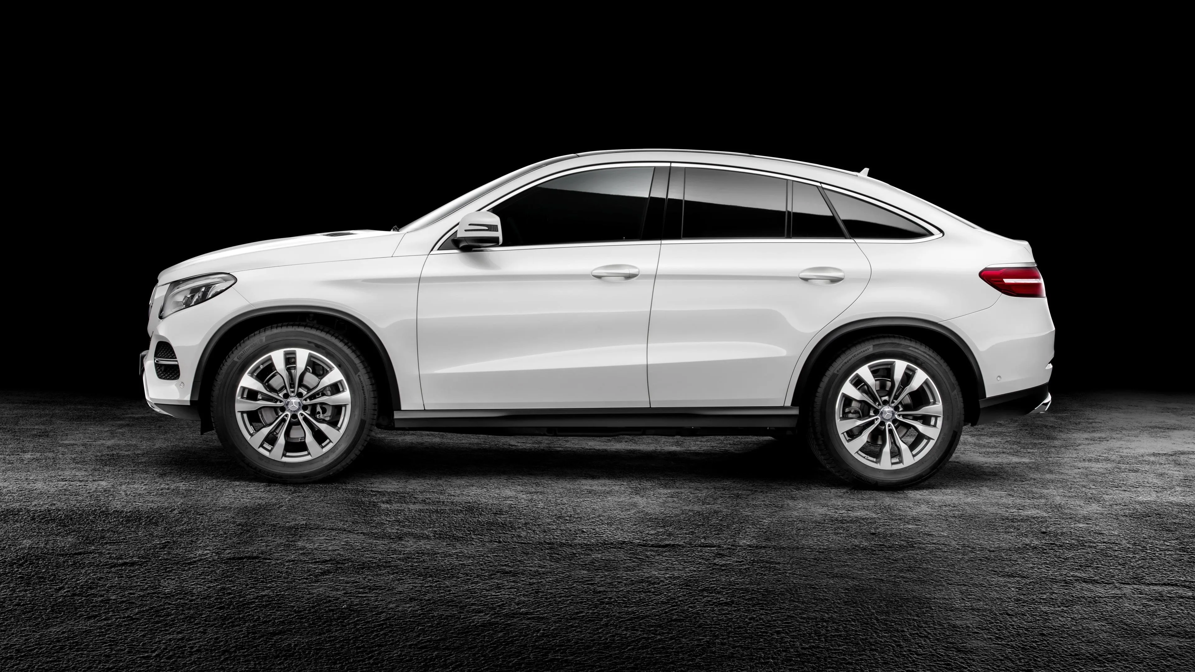 White Mercedes Benz SUV Side Profile on Black Background