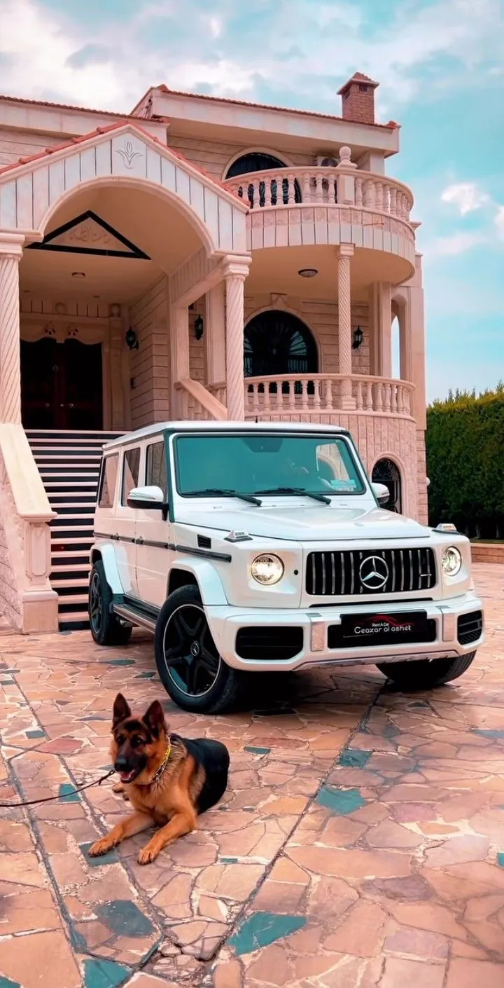 White Mercedes G Wagon Parked Outside Luxury Mansion