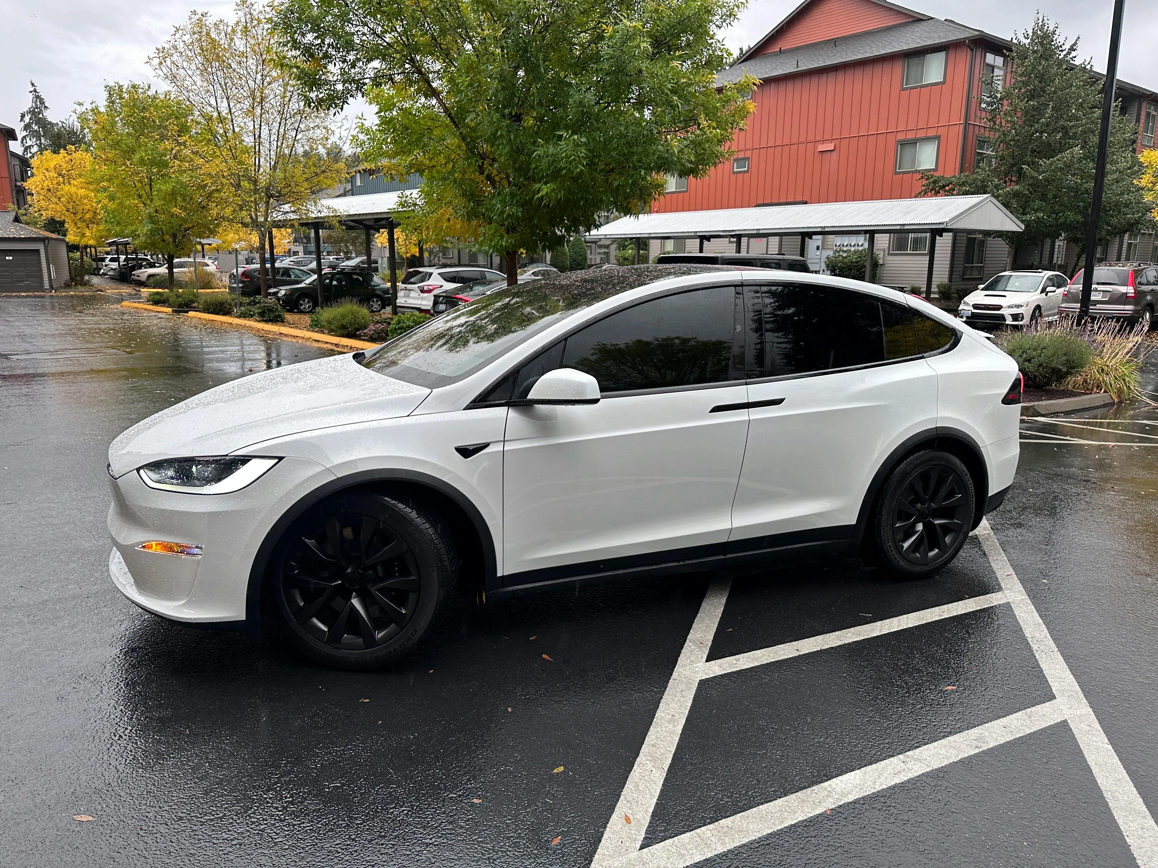 White Tesla Model X in Lot with Black Alloy Wheels HD image