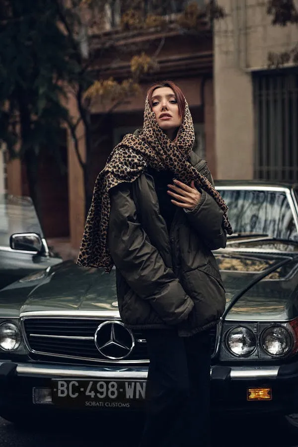 Woman Posing Next to Classic Mercedes Benz Car Wallpaper