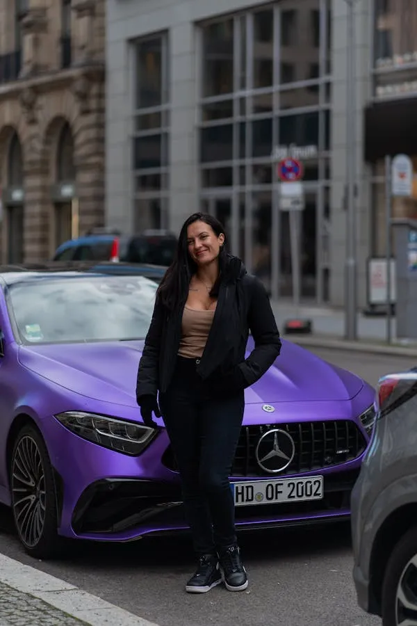 Woman Standing Near Purple Mercedes Benz Sedan Wallpaper