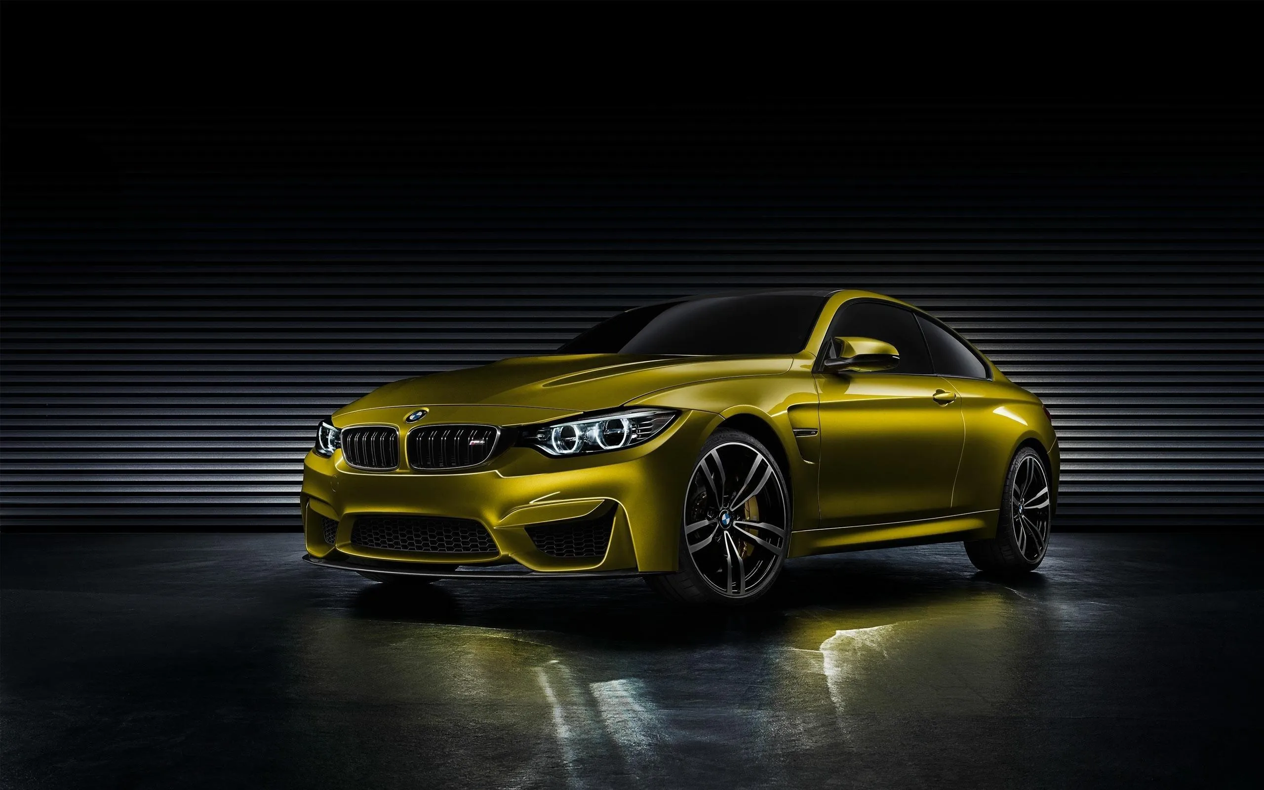 Yellow Bmw Coupe Shown in Dark Studio with Spotlight