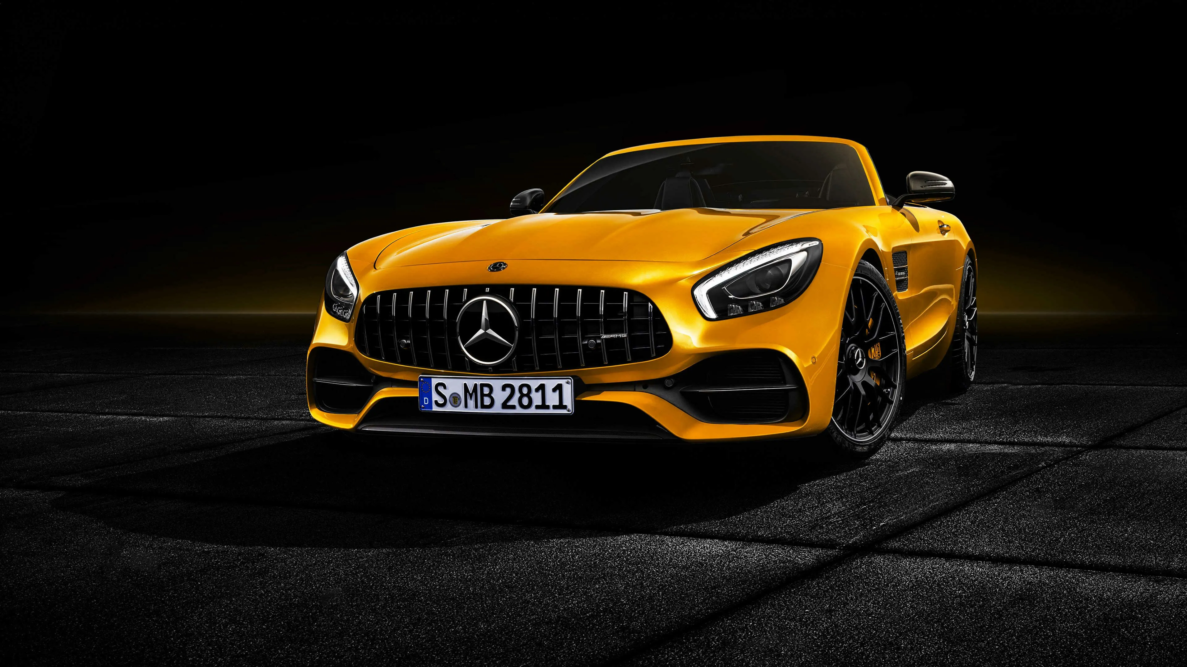 Yellow Mercedes AMG Ready for Track Action Wallpaper