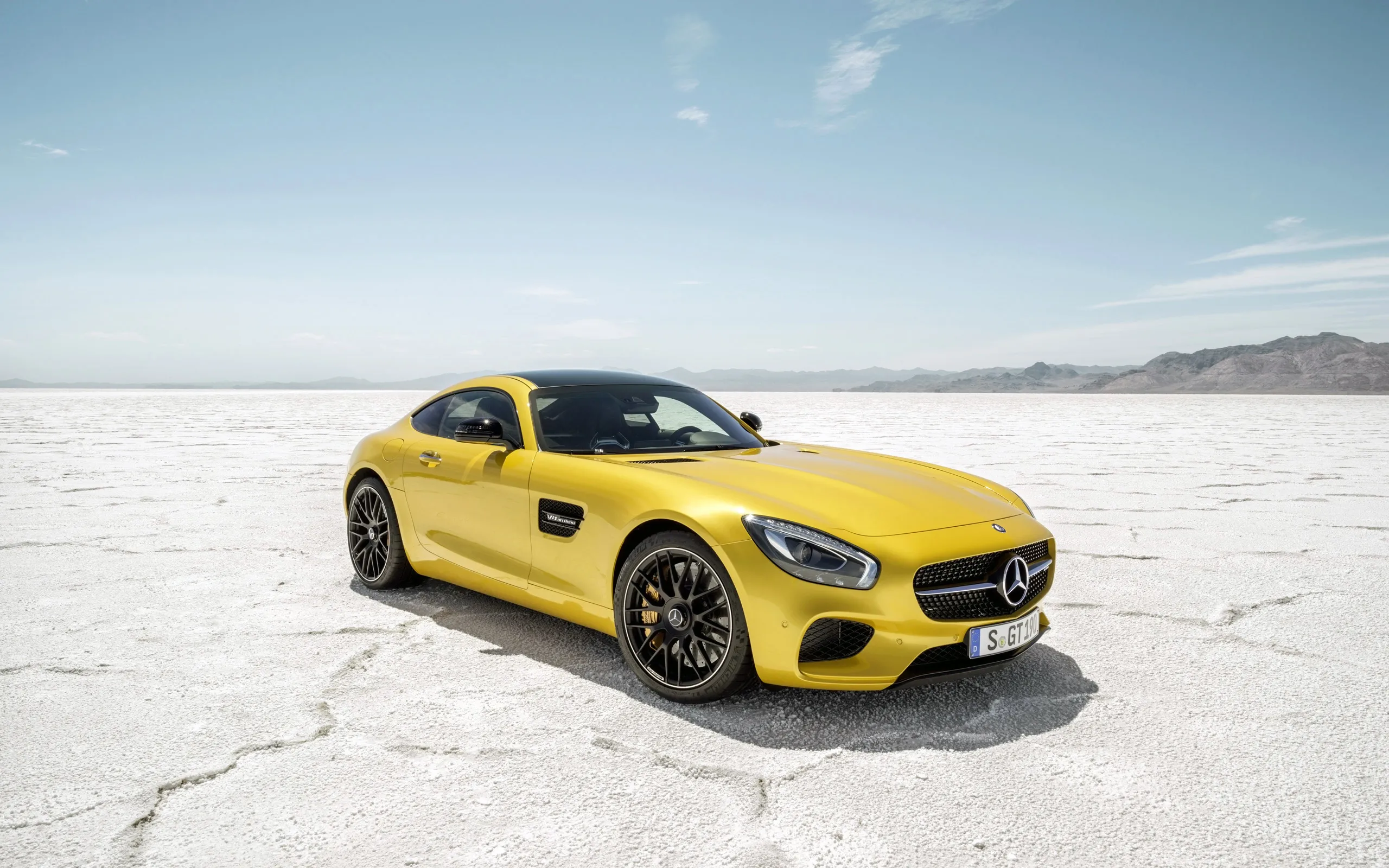 Yellow Mercedes Benz Coupe on White Desert Surface Wallpaper