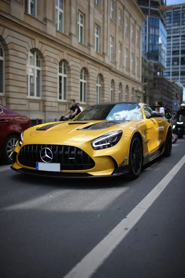 Yellow Mercedes Benz Sports Car Parked in City Street