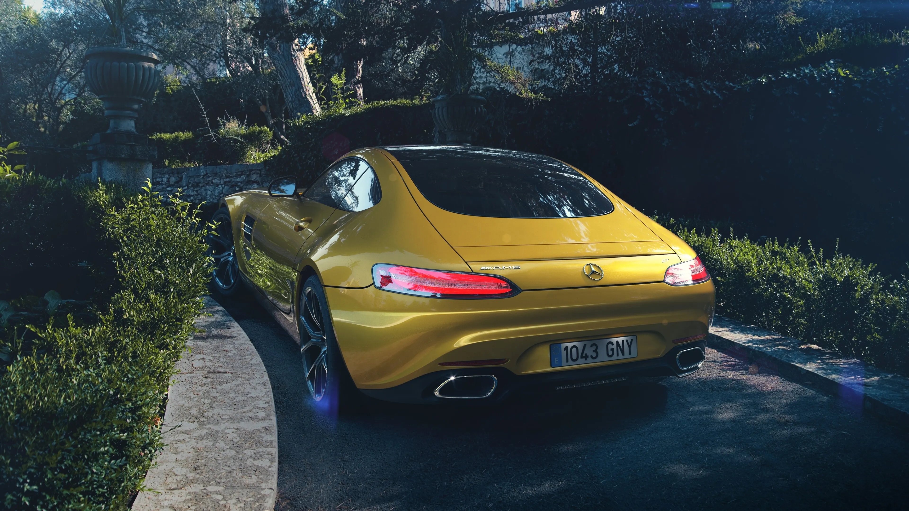 Yellow Mercedes Coupe Parked in a Shaded Garden Area